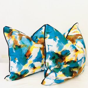 Marine blue and yellow patterned set of 2 cushions
